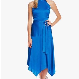 Vince Camuto mock neck dress with handkerchief skirt.